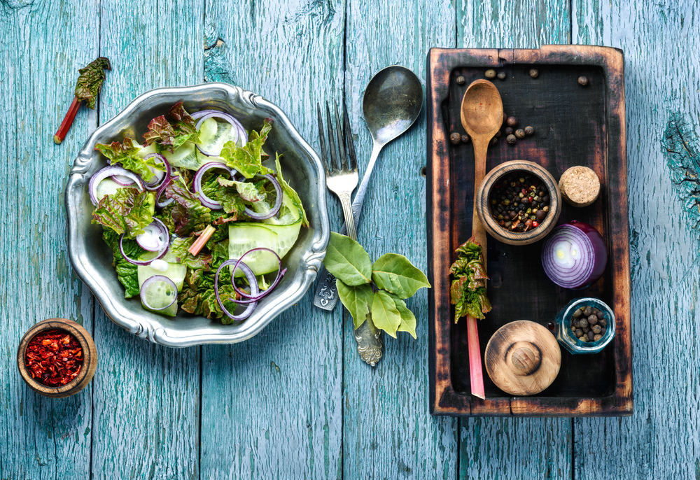 Rhubarb salad.Spring salad.Vegetables salad in salad bowl.Healthy food. Spring vegetable salad