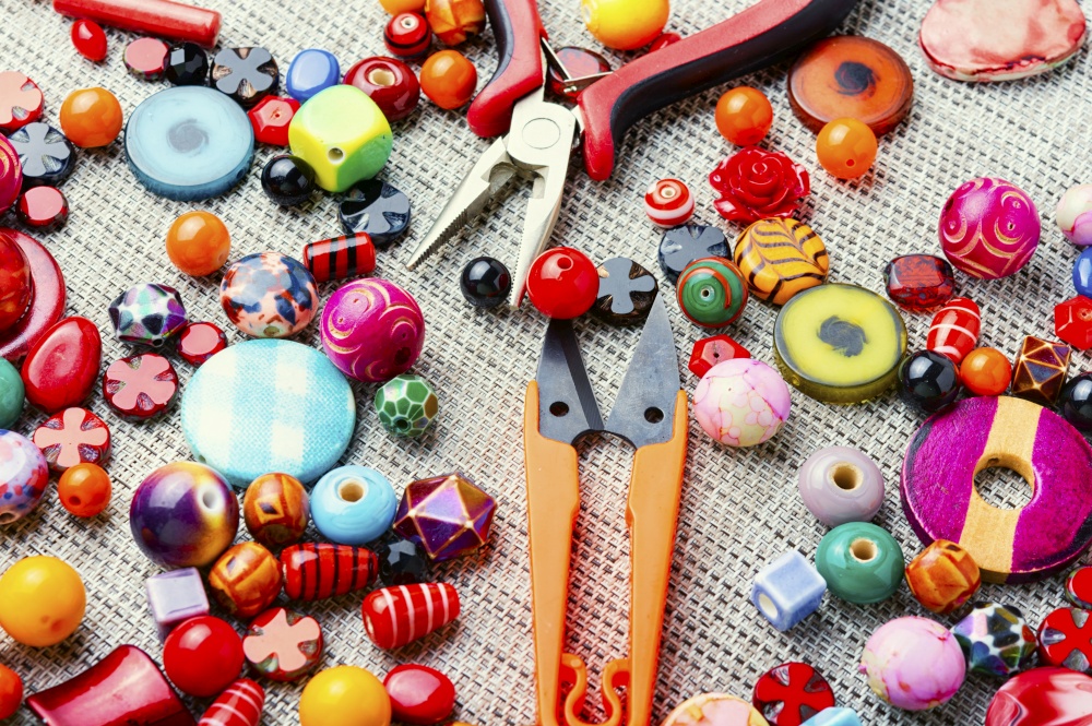 Set of beads of different shapes and sizes for making jewelry.Handicraft. Bead jewelry making