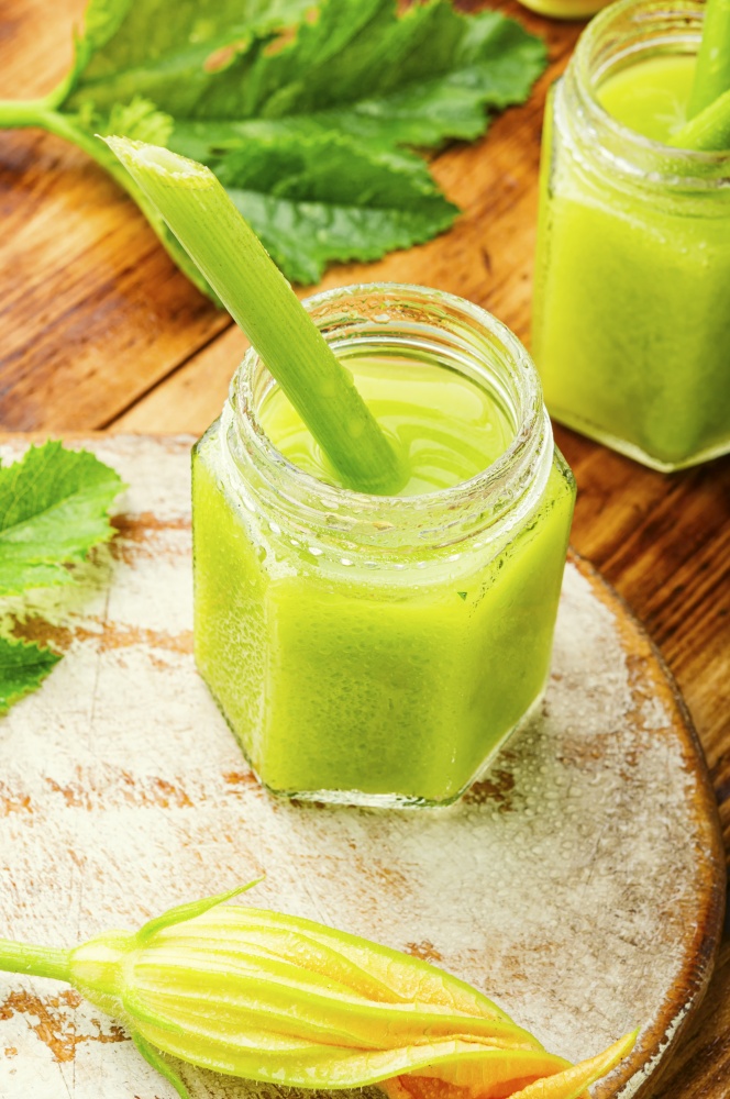 Green fresh raw smoothie from zucchini.Healthy beverage. Green detox smoothie
