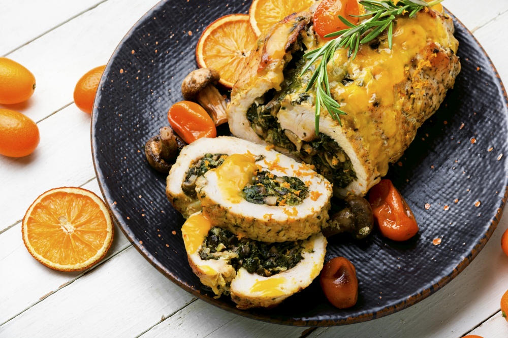Turkey meatloaf with spinach and mushrooms.Meat roll with kumquat and orange sauce.. Turkey meatloaf stuffed with herbs