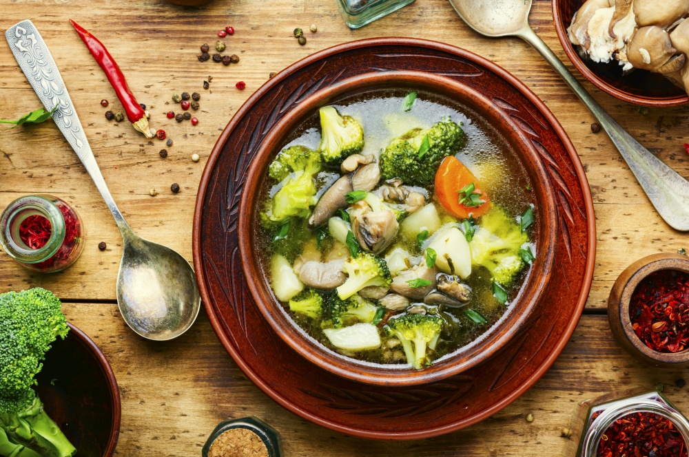 Diet vegetable soup with mushrooms and broccoli. Soup with broccoli and mushrooms