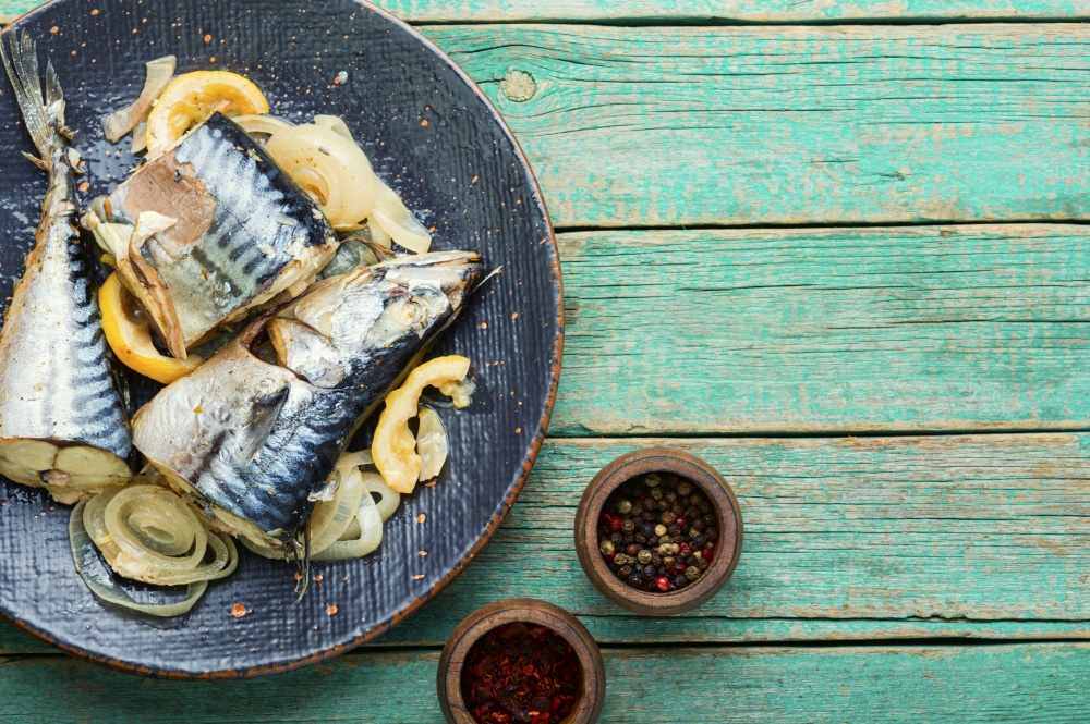Steamed mackerel pieces on a plate.Fish stew.Diet food. Baked or steamed fish mackerel