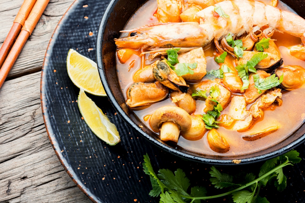 Tom yam kung spicy thai seafood soup in bowl.Thai food,Tom yum soup. Thai tom yum soup with shrimp