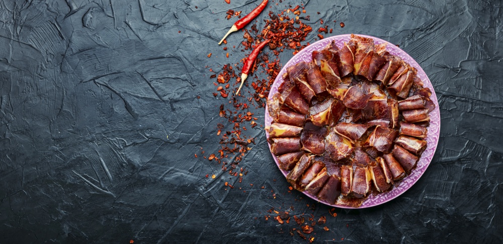 Sliced basturma or meat jerky.Beef jerky,dried beef.Armenian food. Sliced basturma or jerky