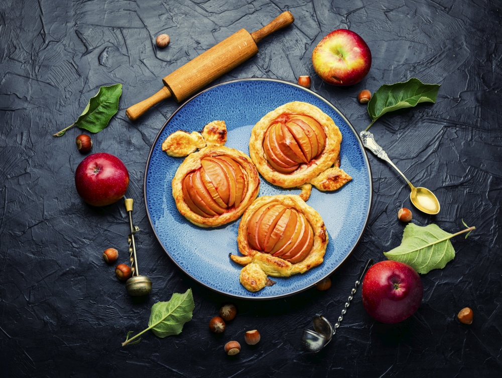 Autumn homemade apple pie.Small apple mini pie.Fruits baked in dough.Flat lay. Apple mini pie