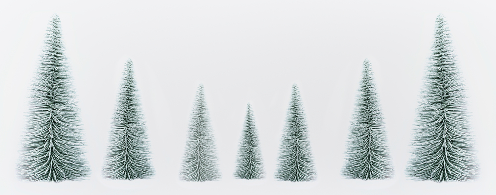 Decorative Christmas fir trees forest on  white background, banner