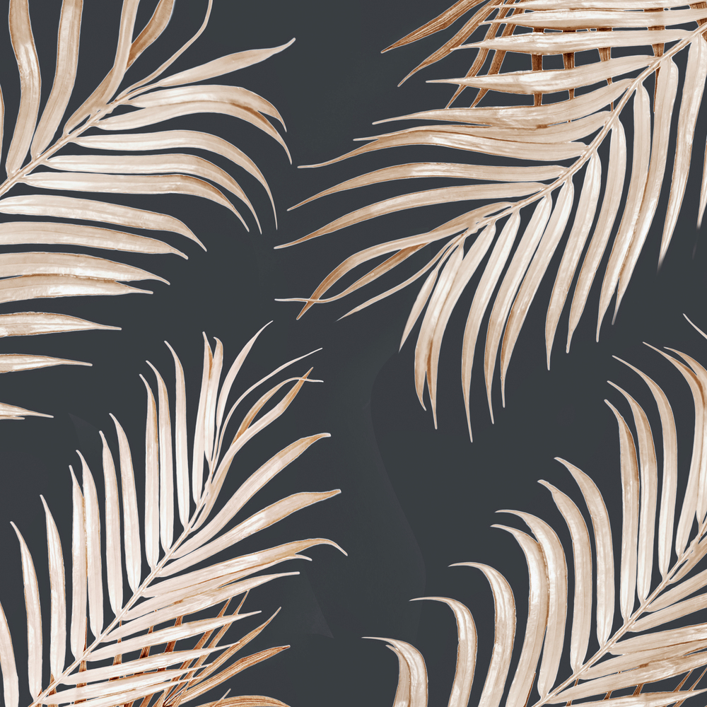 Light golden curved palm leaves pattern on dark background. Tropical concept. Creative layout