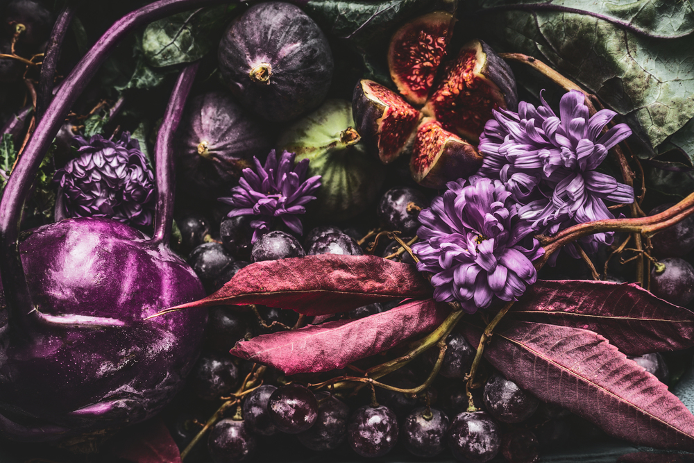 Background of purple food with fruits and vegetables, close up