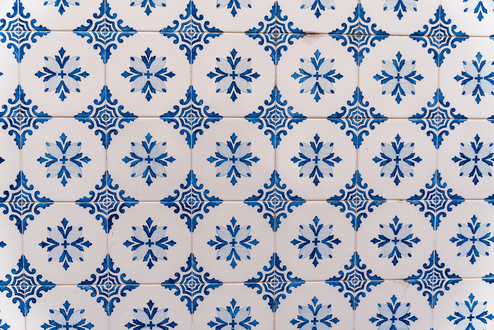 Traditional Portuguese tiles from a building in a street in Lisbon.