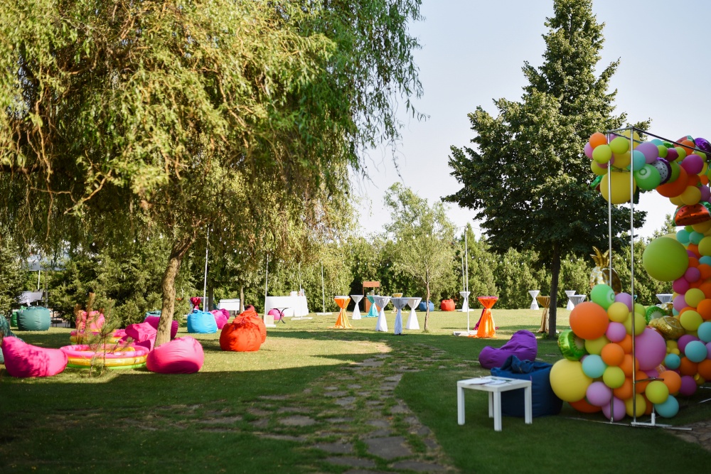 colorful, inflatable, soft seating areas on the lawn before the party