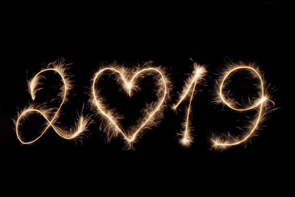 2019 numbers written by sparklers on black background.. 2019 numbers written by sparklers .
