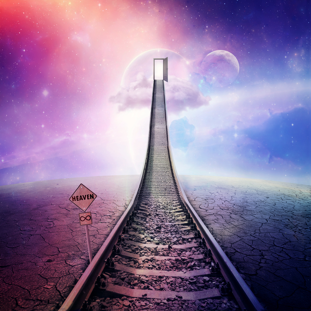 Railroad of opportunity along a cracked desert ground, going up as a staircase to a opened door in space, road to heaven symbol. Success plan, business concept