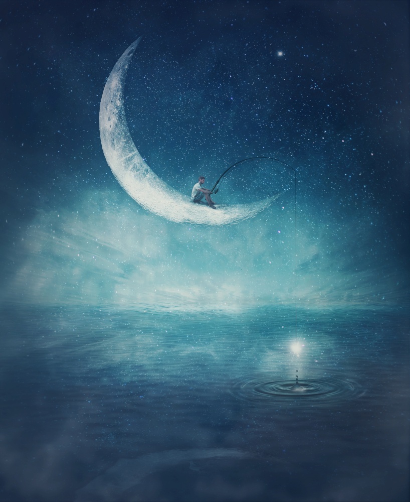 Surreal scene with a boy fishing for stars, seated on a crescent moon with a rod in his hands. Magical adventure concept. Wonderful starry night sky reflecting over the clear blue ocean water.
