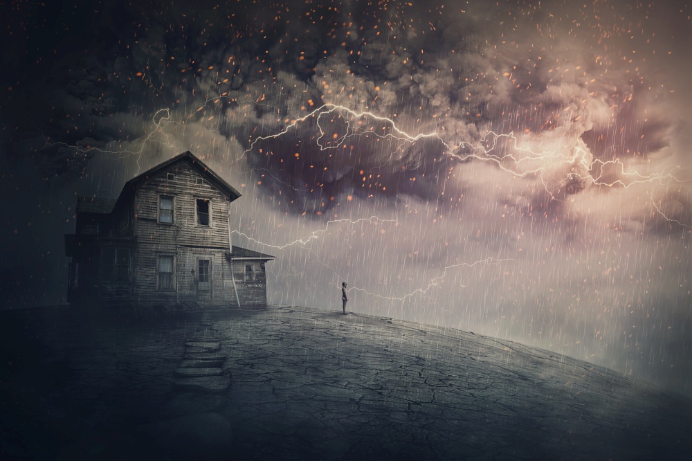 Creepy storm scene with scary lightnings over a ghost land with a haunted house and a person phantom standing under rain. Desolated mansion facing a hurricane. Spooky seasonal Halloween landscape