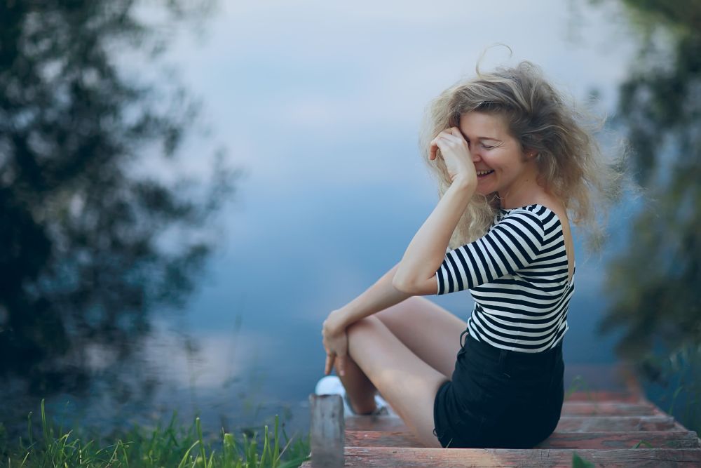 laugh, girl model laughs cheerfully, emotional photo of an adult happy woman