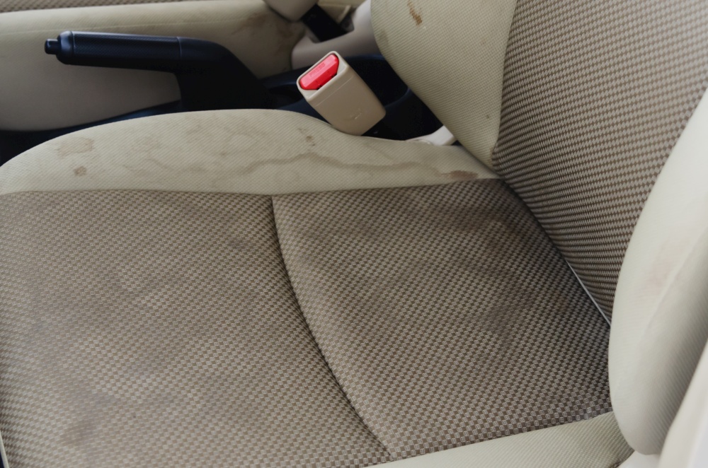Car interior, stains on car upholstery. car upholstery dirty