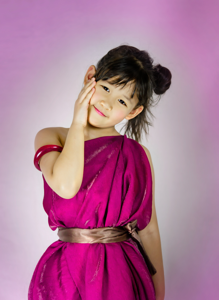 Portrait of asian little  girl in pink dress. portrait of asian little  girl