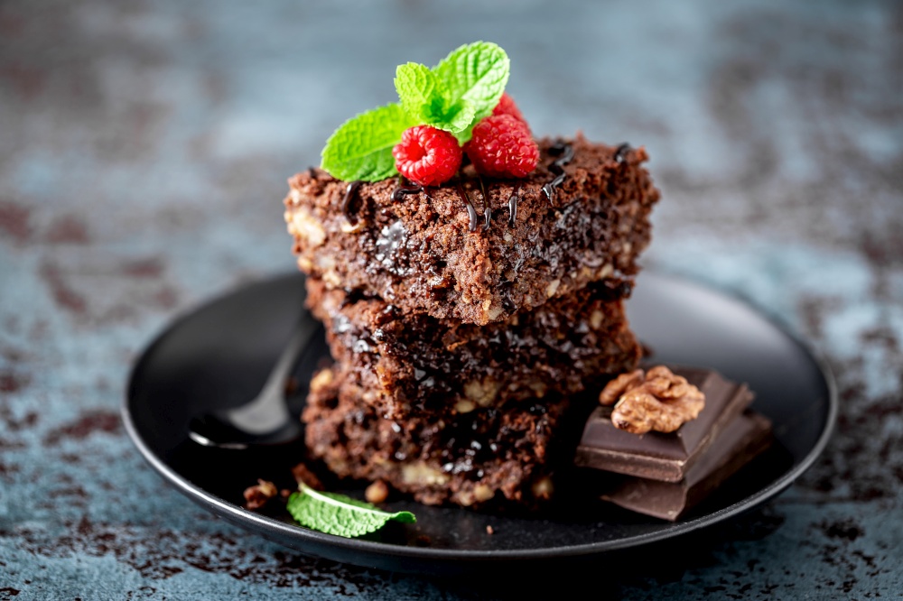 Brownie cake slices on a dark background