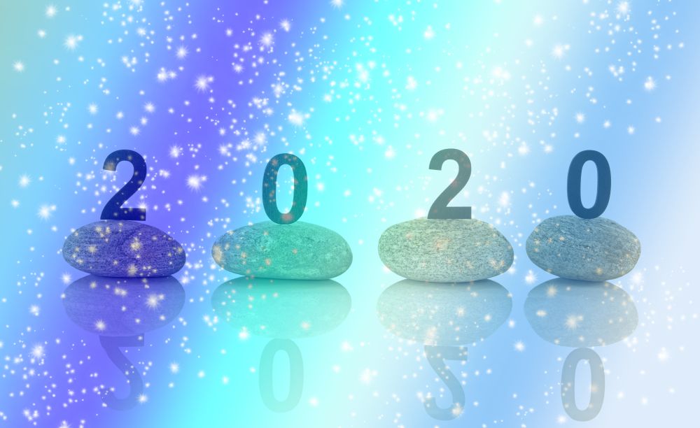 New years resolution 2020 concept, Wooden year number on stones isolated on white background with reflection and copy space. New years resolution 2020 concept