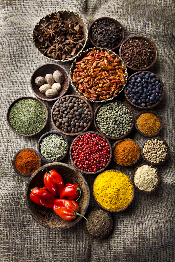 Spices on a wooden table, orintal cuisine vivid theme