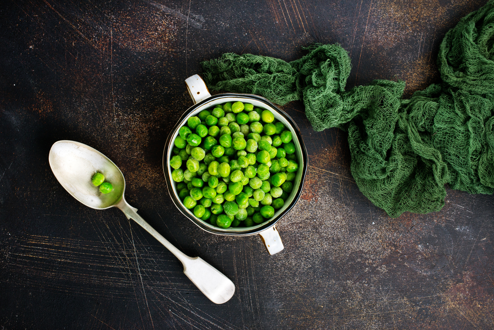 green peas in bowl on a table