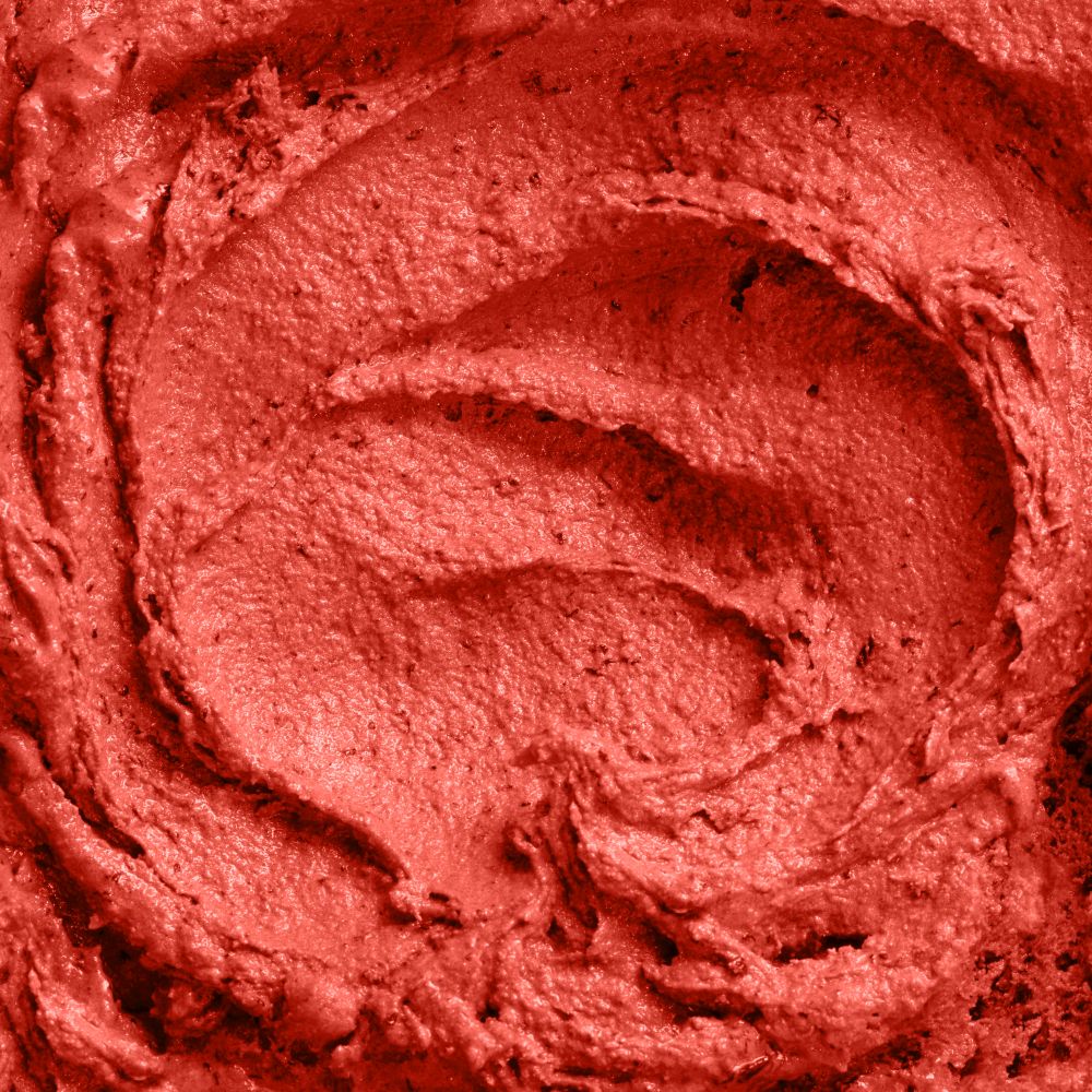Delicious berry ice cream textured background in a trendy color of the year 2019 Living Coral Pantone. Close up.. Close up texture of ice cream in a color background of the year 2019 Living Coral Pantone.
