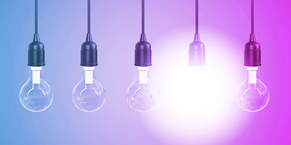 Glowing Light Bulb as a Business Innovation Concept. Glowing Light Bulb