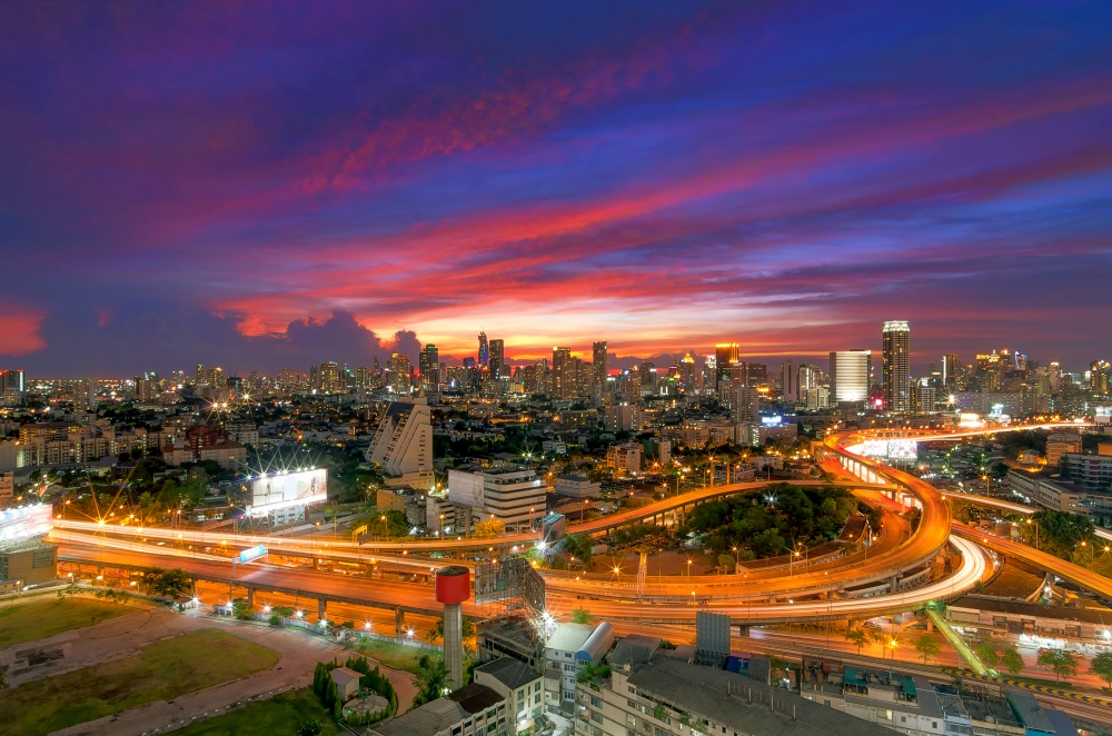 Landscape of Expressway And building a modern business district in the background a beautiful sunset sky.. Bangkok expressway.