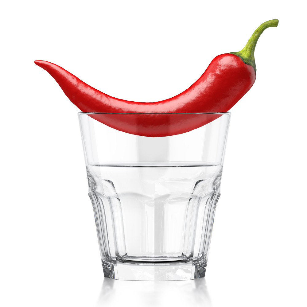 Whiskey clear glass with red chilli. Whiskey clear glass with red chilli. 3d illustration