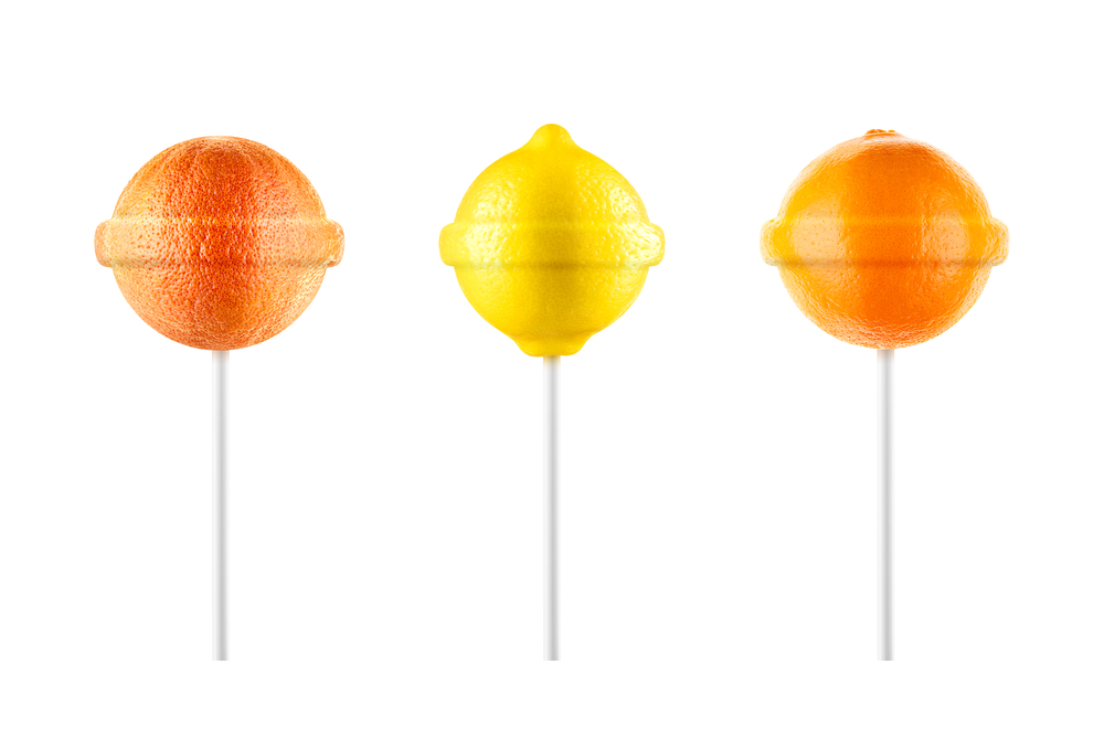 Lollipops. Lemon, grapefruit, orange set isolated on white background. Creative candy idea. Lollipops. Lemon grapefruit orange