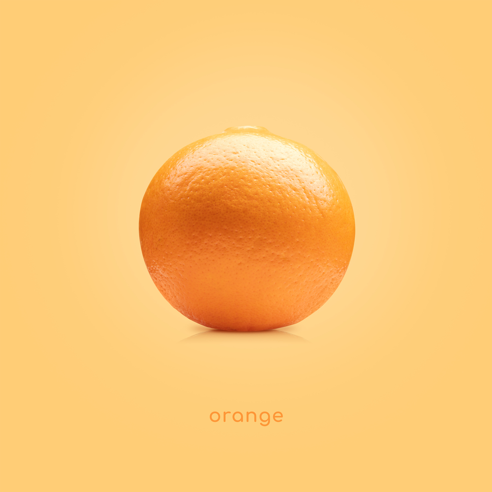 Orange fruit isolated on orange background. Orange fruit