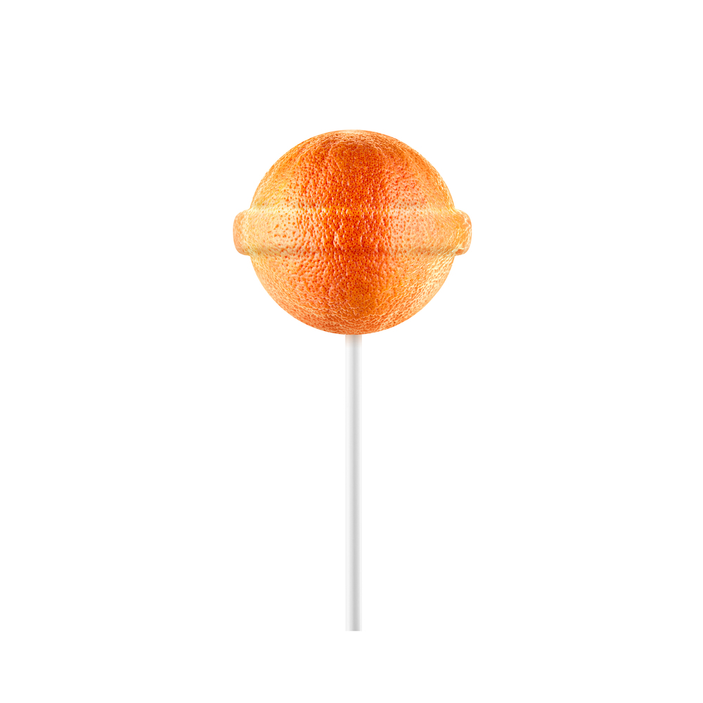 Lollipop grapefruit isolated on white background. Creative candy idea. Lollipop grapefruit