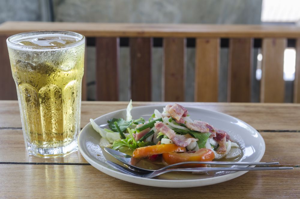 Thai food salad with beer