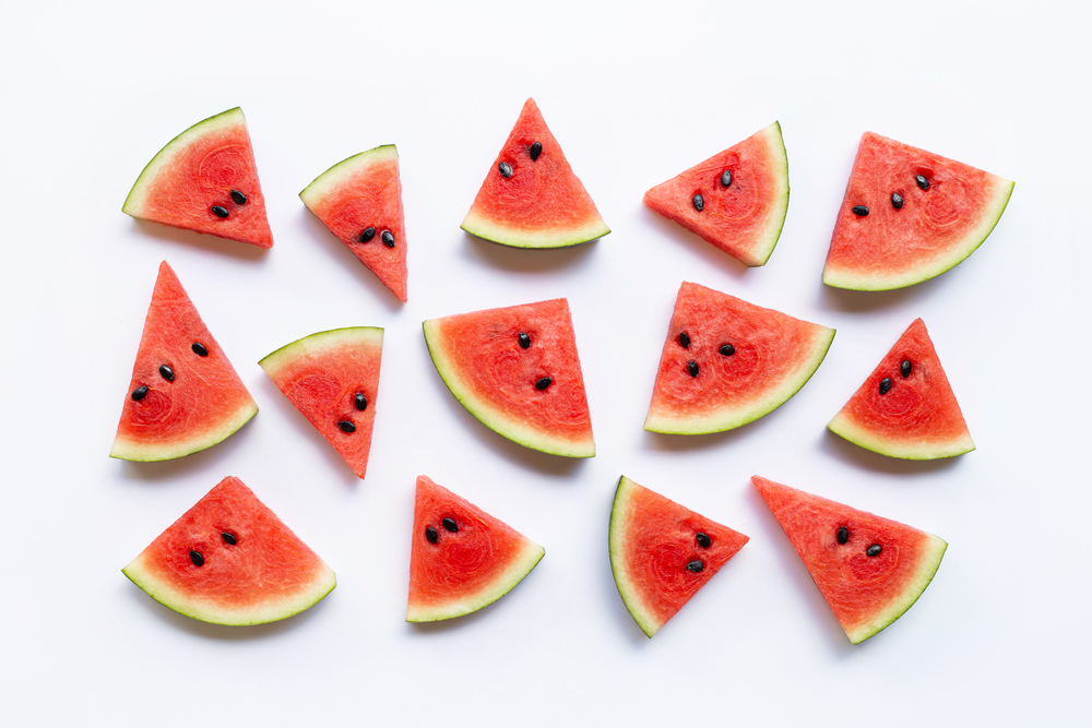Slices of watermelon isolated on white background, top view