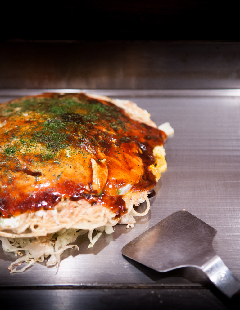 Hiroshima style Okonomiyaki. Hiroshima famous local dishe.