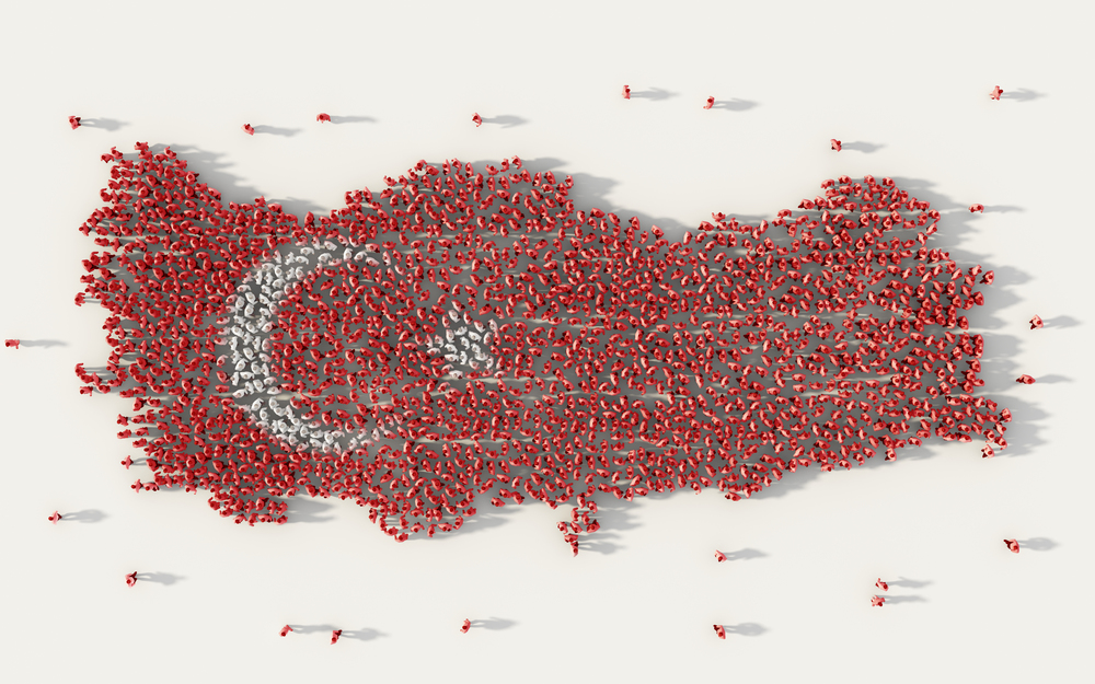 Large group of people forming Turkey map and national flag in social media and communication concept on white background. 3d sign symbol of crowd illustration from above gathered together