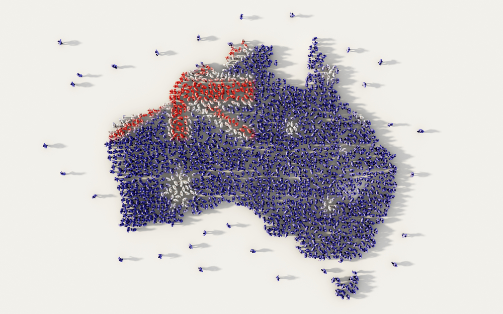 Large group of people forming Australia map and national flag in social media and communication concept on white background. 3d sign symbol of crowd illustration from above gathered together