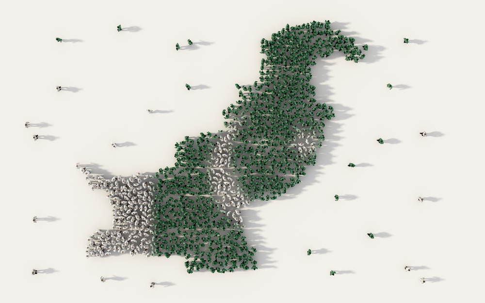 Large group of people forming Pakistan map and national flag in social media and communication concept on white background. 3d sign symbol of crowd illustration from above gathered together