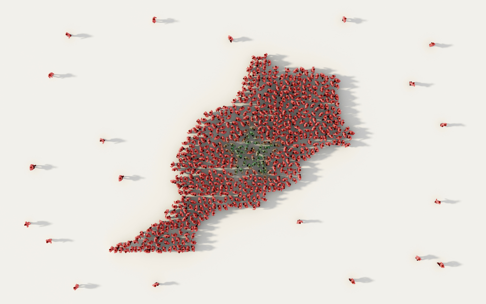 Large group of people forming Morocco map and national flag in social media and community concept on white background. 3d sign symbol of crowd illustration from above gathered together
