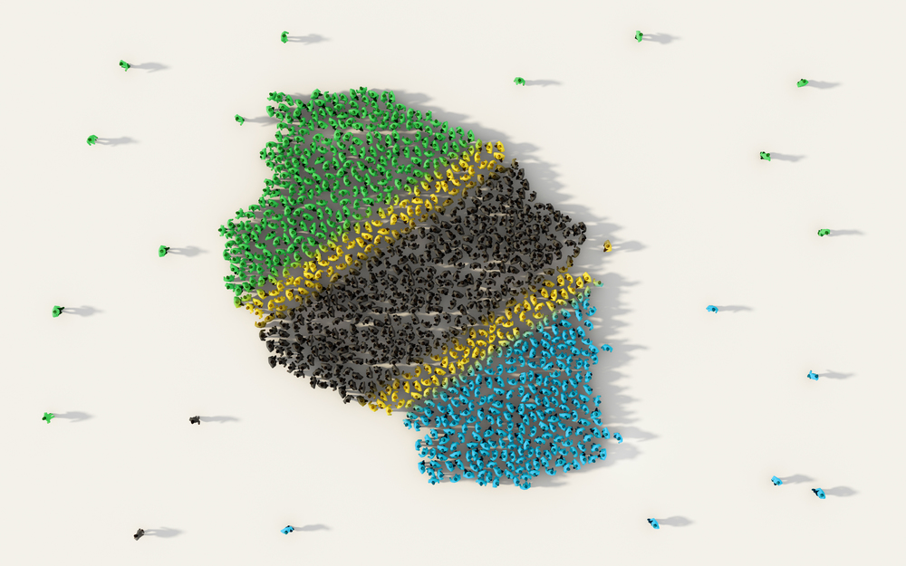Large group of people forming Tanzania map and national flag in social media and community concept on white background. 3d sign symbol of crowd illustration from above gathered together