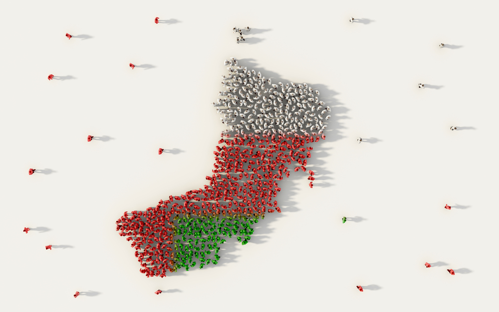 Large group of people forming Oman map and national flag in social media and community concept on white background. 3d sign symbol of crowd illustration from above gathered together