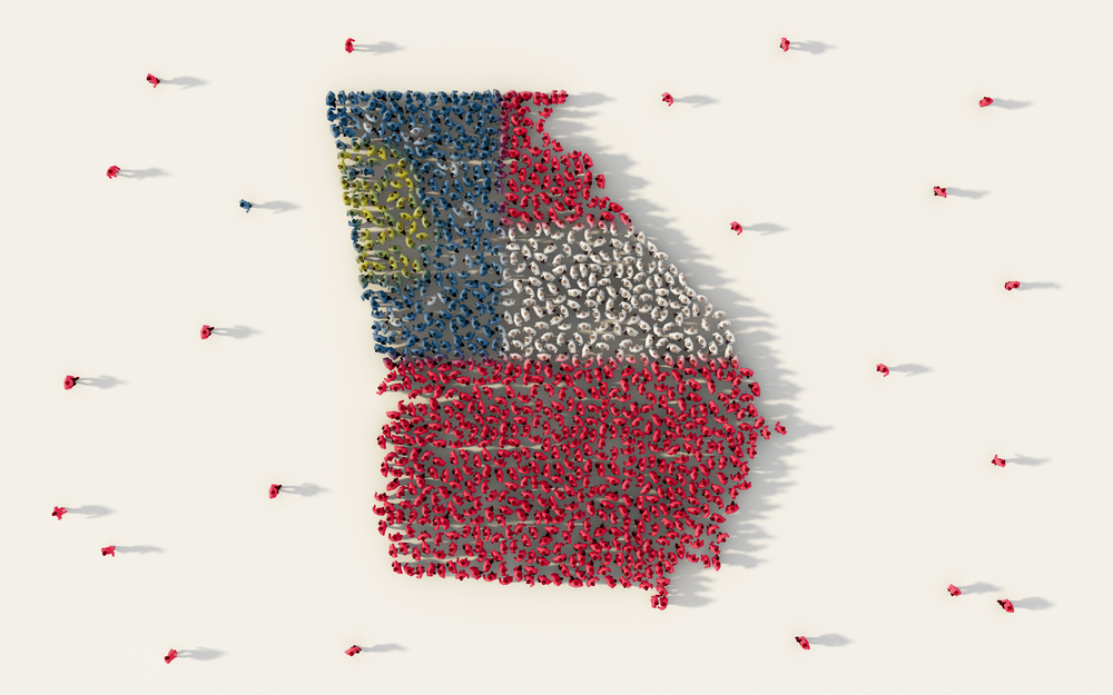 Large group of people forming Georgia flag in The United States of America in social media and community on white background. 3d sign symbol of crowd illustration from above gathered together