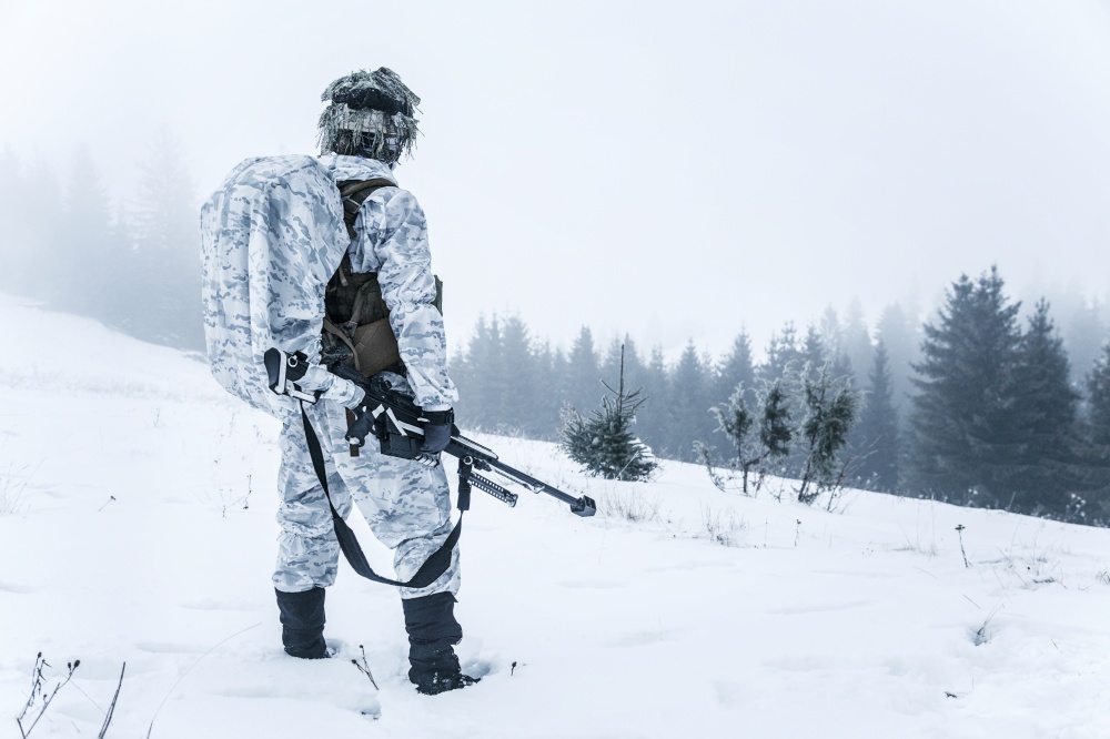Winter arctic mountains warfare. Action in cold conditions. Sniper with weapons. Action in cold conditions sniper with weapons