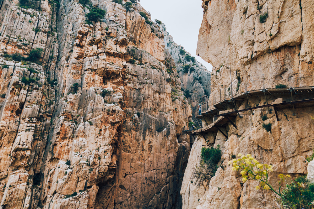Wooden walkway among rock mountains in south of Spain and runway on the rock mountains