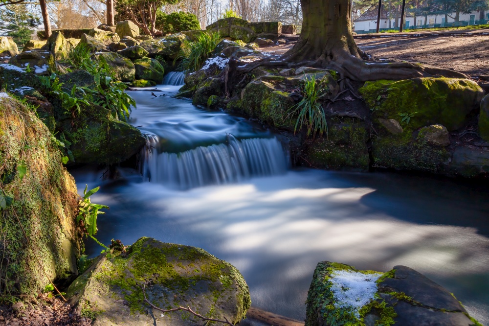 Winter long exposure of Beddington Park waterfall in Wallington, London, England