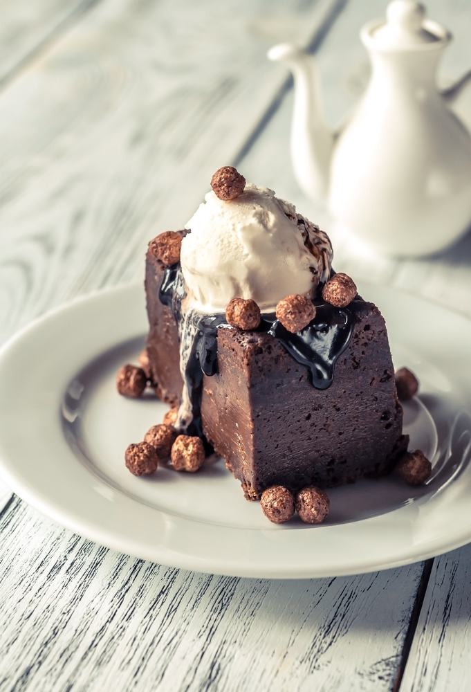 Chocolate brownie with vanilla ice cream and cocoa balls