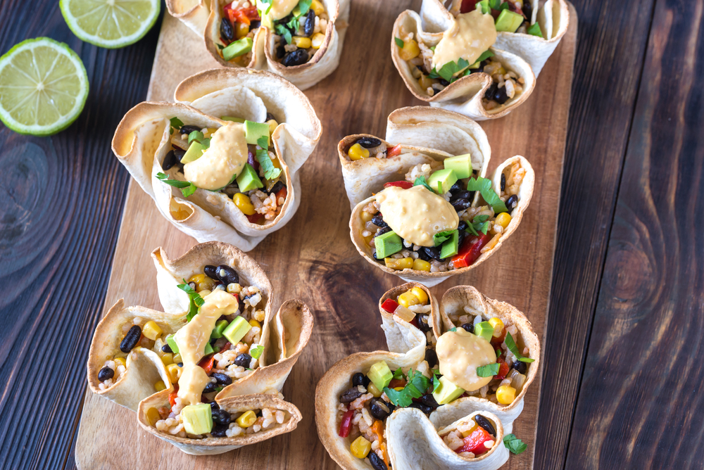 Tortilla burrito bowls stuffed with rice and vegetables