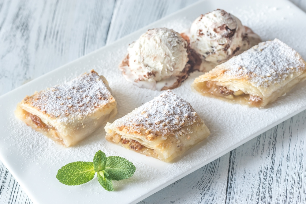 Slices of apple strudel on the white plate