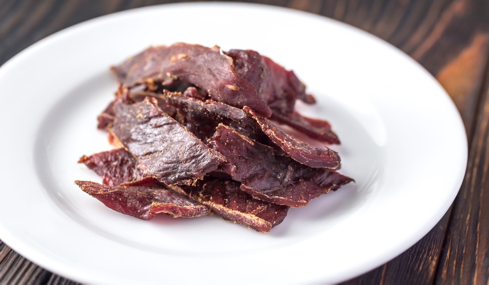 Beef jerky on the white plate