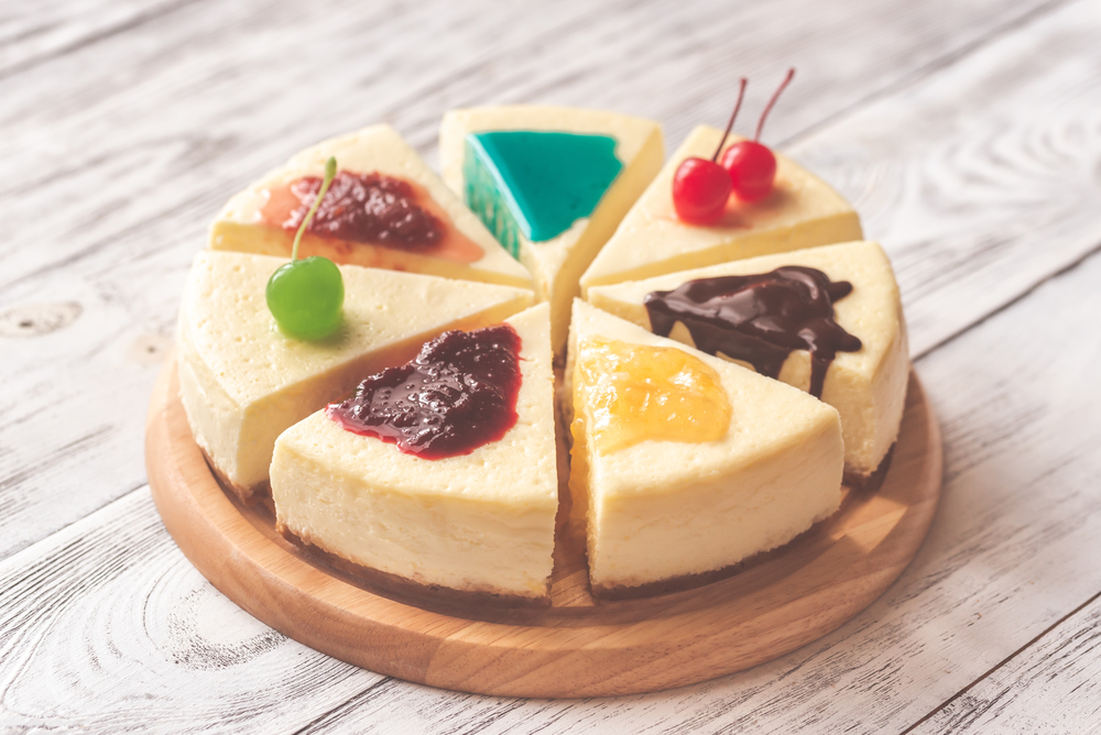 Pieces of cheesecake with different toppings